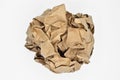 Brown and beige crumpled paper ball. Royalty Free Stock Photo