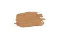 Brown, beige isolated Swatch of lipstick on a white background. A smear of makeup. The base for makeup has a creamy texture