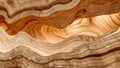 Brown and Beige Stone Flowing Wave Texture Royalty Free Stock Photo