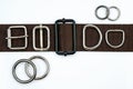 Brown belt with adjusters, buckles, rings,