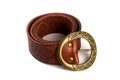 Brown belt with bronze buckle Royalty Free Stock Photo