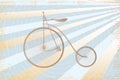 Brown bicycle illustration in stippling retro style on stripes background made in light blue and light yellow colors Royalty Free Stock Photo