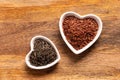 Brown and black rice long in a white plate in the shape of a heart close up Royalty Free Stock Photo