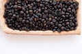 Brown and black roasted arabica coffee baens. mashed roasted coffee beans is ingredients of espresso, cappuccino, latte, mocha, Royalty Free Stock Photo