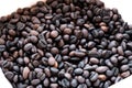Brown and black roasted arabica coffee beans. mashed roasted coffee beans is ingredients of espresso, cappuccino, latte, mocha, Royalty Free Stock Photo