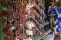 Brown and black sandals hanging from a string for sale at Olvera Street in Los Angeles California