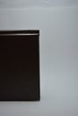 Brown, black small book, notebook with bookmark, diary arranged on white background. Royalty Free Stock Photo