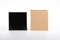 Brown and black square box cardboard on white background Royalty Free Stock Photo