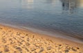 Brown and blue background, natural sand pattern and water closeup Royalty Free Stock Photo