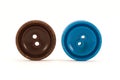 Brown and blue clothes buttons Royalty Free Stock Photo