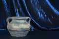 Brown and blue pottery on blue background