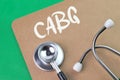 Brown board written with CABG stands for Coronary Artery Bypass Grafting Royalty Free Stock Photo
