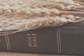 Brown book of holy bible and wheat for concept of faithful and followship background Royalty Free Stock Photo