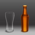 Brown bottle with beer and empty tall glass