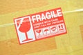 brown box packaging with warning symbol Royalty Free Stock Photo