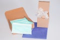 Brown boxes gloves and medical protective mask on white background protect respiratory virus Coronavirus COVID-19