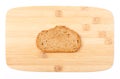 Brown bread slice on bamboo board Royalty Free Stock Photo