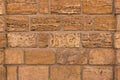 Brown brick blocks sand shell limestone natural texture wall background Royalty Free Stock Photo