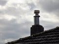 Brown brick metal funnel chimney Royalty Free Stock Photo