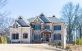 Brown Brick and Stone House in Winter Royalty Free Stock Photo