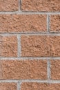 Brown brick vertical wall texture old stone background masonry Royalty Free Stock Photo