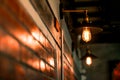 Brown brick wall and light bulb