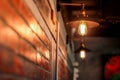 Brown brick wall and light bulb Royalty Free Stock Photo