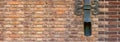 Brown brick wall with a shod decor