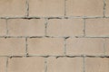 Brown brick wall texture with gray mortar