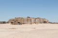 This brown bunker was used in the revolutionary war. The brown walls now buried in the sand sits as a reminder of what once was.