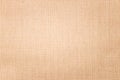 Brown burlap texture background. Weave textile material or blank cloth Royalty Free Stock Photo
