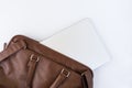 Brown business leather briefcase with notebook  background Royalty Free Stock Photo