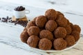 Brown candies on white plate. Royalty Free Stock Photo