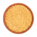 Brown cane sugar in a bowl isolated on white background, top view Royalty Free Stock Photo