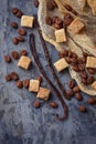 Brown cane sugar, coffee beans and vanilla pods Royalty Free Stock Photo