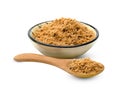 Brown cane sugar pile with wooden spoon and ceramic bowl on white background ,include clipping path Royalty Free Stock Photo