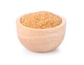 Brown cane sugar in wooden bowl on white background Royalty Free Stock Photo