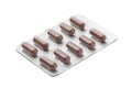 Brown capsules in aluminum blister pack Royalty Free Stock Photo