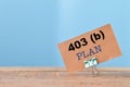 Brown card with text 403 B PLAN. Conceptual image Royalty Free Stock Photo