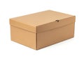 A rectangular brown cardboard box with a closed lid and a finger cutout on a white background for packaging purposes Royalty Free Stock Photo
