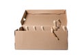 Brown cardboard box with wooden mannikins. One of them is looking out of it while others are sitting. Thinking outside the box Royalty Free Stock Photo