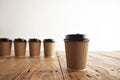 Brown cardboard take away paper cups with black caps set