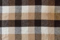 Brown checkered wool plaid fabric texture. tartan texture Royalty Free Stock Photo
