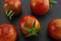 Brown cherry tomatoes on white