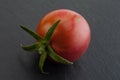 Brown cherry tomatoes on white