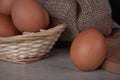 Brown chicken egg close up, fresh eggs in a wicker basket Royalty Free Stock Photo