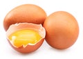 Brown chicken eggs and egg yolk isolated on white background Royalty Free Stock Photo