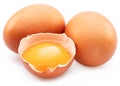 Brown chicken eggs and egg yolk isolated on white background Royalty Free Stock Photo