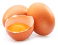 Brown chicken eggs and egg yolk isolated on white background Royalty Free Stock Photo