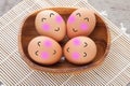 Brown chicken eggs with happy face. Royalty Free Stock Photo